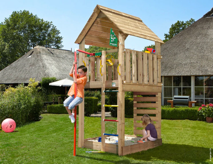 Jungle Cabin | Wooden climbing frame with fireman's pole Jungle Cabin | Wooden climbing frame with fireman's pole